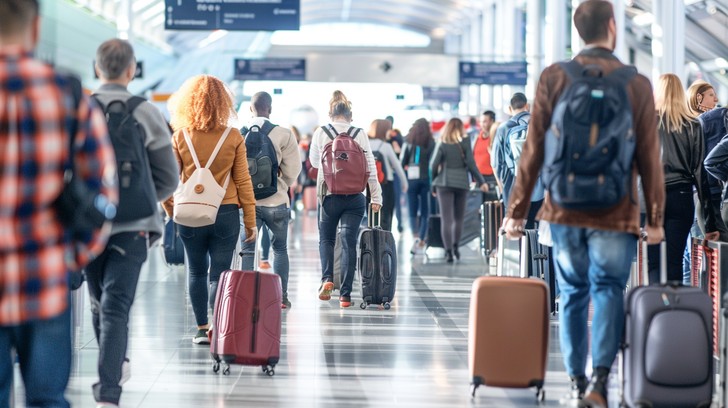 Corporate traveler at the airport for business flights and work trips